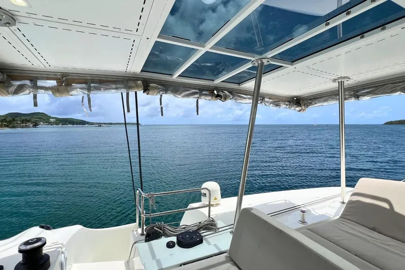 Dignity Yacht Photos Pics Lagoon 50 catamaran, 2021 model, offers a serene ocean view from its deck.