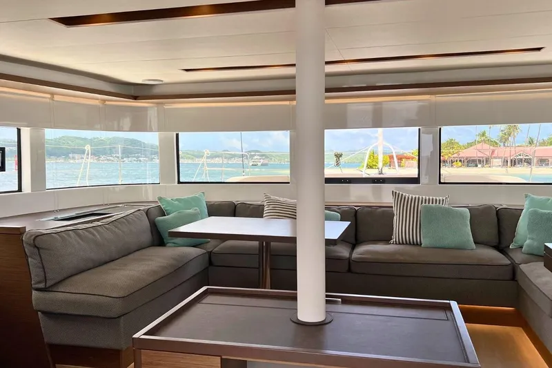 Dignity Yacht Photos Pics Interior of 2021 Lagoon 50 yacht with spacious seating and ocean view.