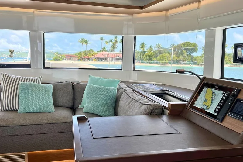 Dignity Yacht Photos Pics Luxurious Lagoon 50 yacht interior with plush seating and navigation system, 2021 model.