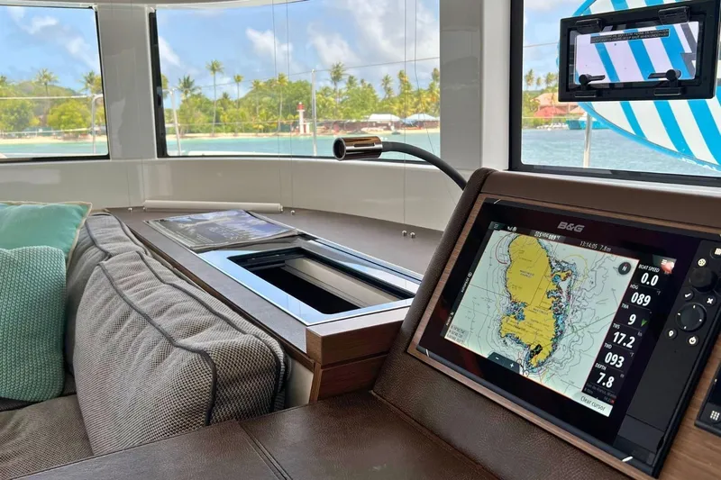 Dignity Yacht Photos Pics Interior of 2021 Lagoon 50 yacht with navigation system and ocean view.
