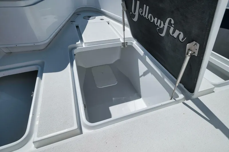  Yacht Photos Pics 2023 Yellowfin 39 Offshore boat storage compartment with open hatch.