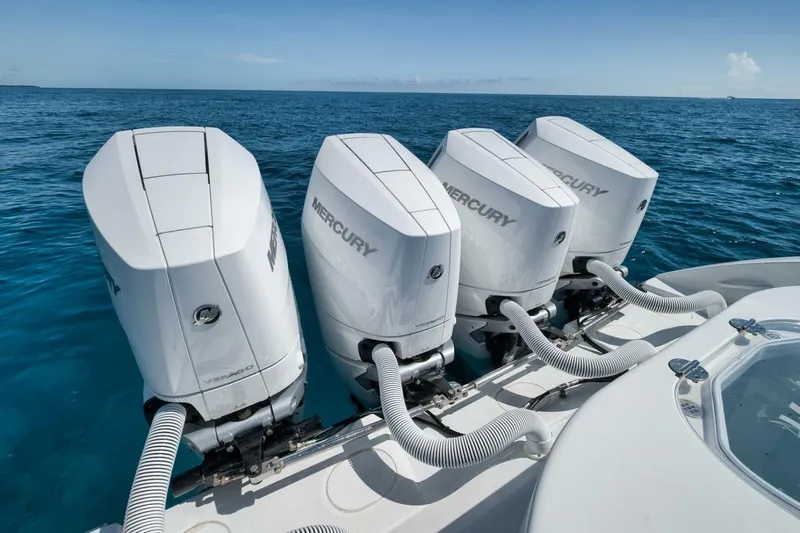  Yacht Photos Pics 2023 Yellowfin 39 Offshore boat with four Mercury outboard engines on open water.