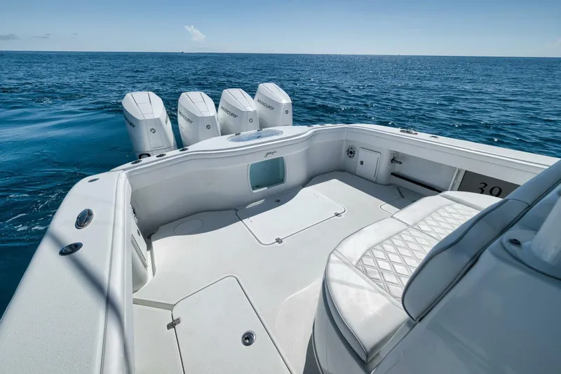  Yacht Photos Pics 2023 Yellowfin 39 Offshore boat with quad Mercury engines on open sea.