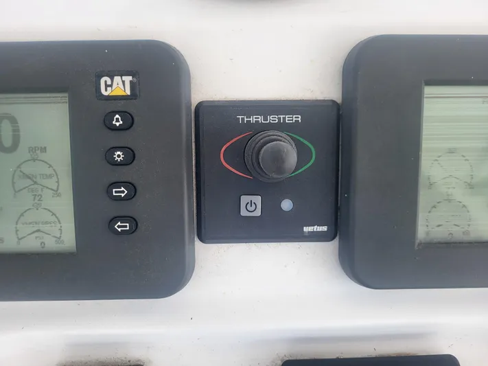 Hailey Girl Yacht Photos Pics Control panel of a 1989 Ocean Yachts 48, featuring CAT and Vetus thruster controls.