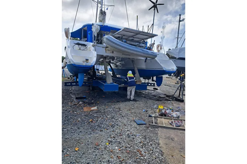 Ocean Mandalay Yacht Photos Pics 2003 Fountaine Pajot Belize 43 catamaran in dry dock, undergoing maintenance.