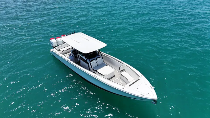  Yacht Photos Pics 2019 Nor-Tech 390 Sport Center Console boat on clear blue water.