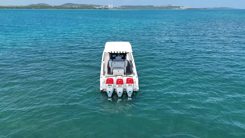  Yacht Photos Pics 2019 Nor-Tech 390 Sport Center Console boat on open blue water.