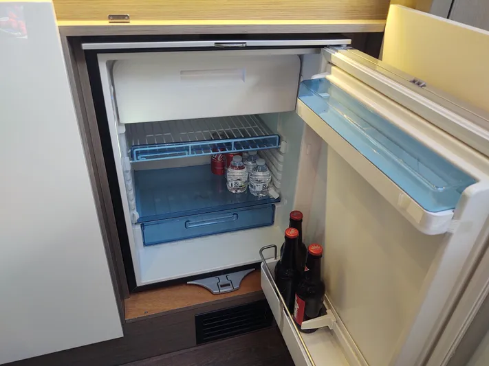 Total Chaos 9 Yacht Photos Pics Total Chaos 9 galley refridgerator open