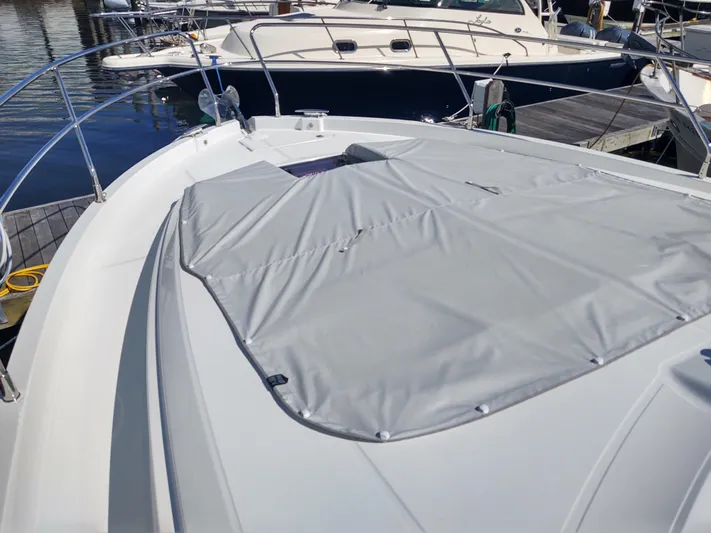 Total Chaos 9 Yacht Photos Pics Total Chaos 9 fwd sunpad with cover and sun shade