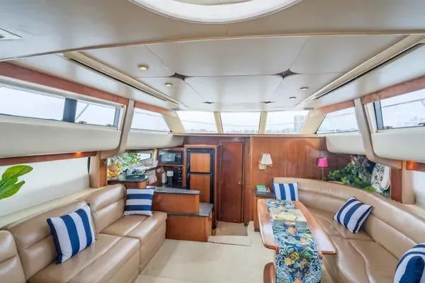 Bella Vita Yacht Photos Pics Luxurious interior of 2007 Meridian 459 Motoryacht with plush seating and elegant decor.