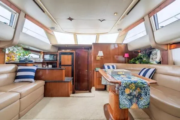 Bella Vita Yacht Photos Pics Luxurious interior of a 2007 Meridian 459 Motoryacht with elegant seating and decor.