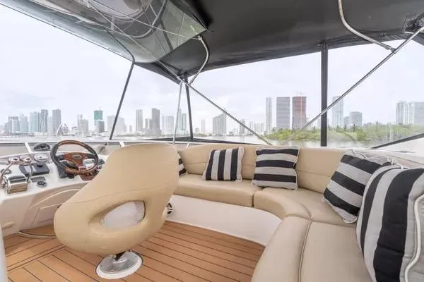 Bella Vita Yacht Photos Pics Luxurious 2007 Meridian 459 Motoryacht interior with city skyline view.