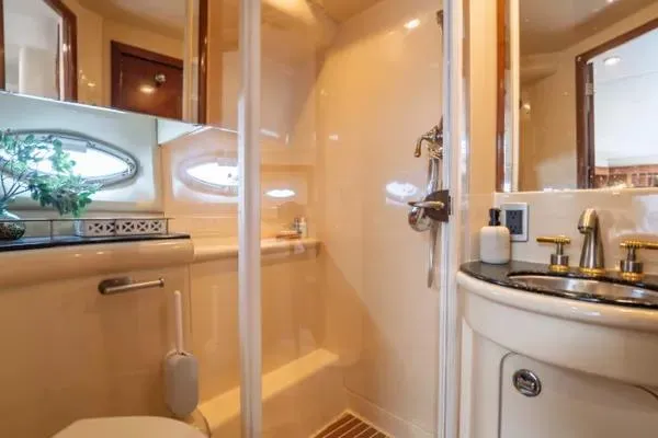 Bella Vita Yacht Photos Pics Luxurious bathroom in 2007 Meridian 459 Motoryacht with elegant fixtures and natural light.