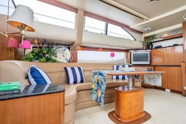 Bella Vita Yacht Photos Pics Luxurious interior of 2007 Meridian 459 Motoryacht with elegant seating and modern amenities.