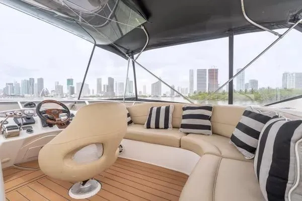 Bella Vita Yacht Photos Pics Luxurious 2007 Meridian 459 Motoryacht interior with city skyline view.