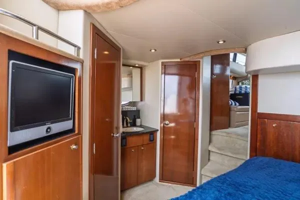 Bella Vita Yacht Photos Pics Luxurious interior of 2007 Meridian 459 Motoryacht with wood finishes and modern amenities.