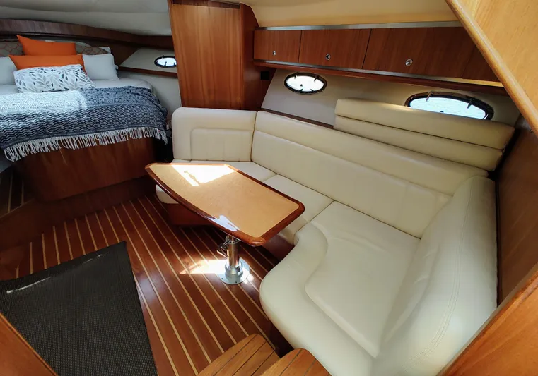 St Mary Yacht Photos Pics 2008 Tiara Yachts 3200 Open interior with cozy seating and elegant wood finishes.