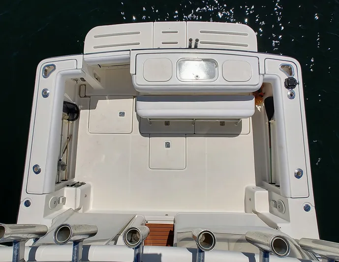 St Mary Yacht Photos Pics 2008 Tiara Yachts 3200 Open boat deck, featuring spacious seating and storage compartments.