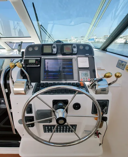 St Mary Yacht Photos Pics Helm of 2008 Tiara Yachts 3200 Open with navigation controls and steering wheel.