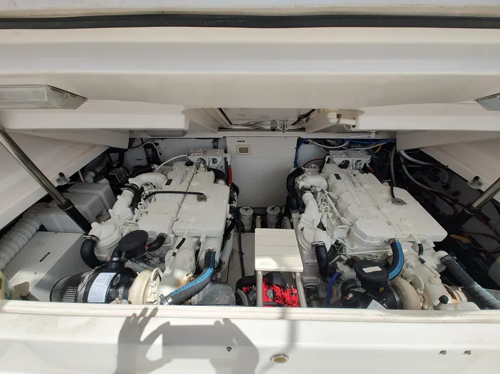 St Mary Yacht Photos Pics Engine compartment of 2008 Tiara Yachts 3200 Open, showcasing dual engines and mechanical components.