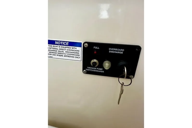  Yacht Photos Pics Control panel on 2016 Boston Whaler 285 Conquest with overboard discharge notice.