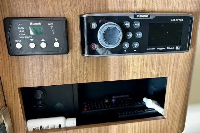  Yacht Photos Pics Control panel on 2016 Boston Whaler 285 Conquest boat with Fusion audio system.