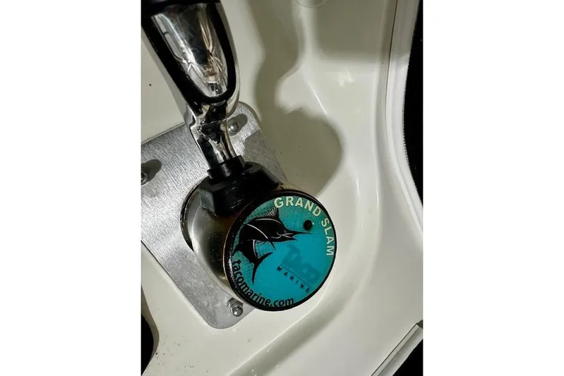  Yacht Photos Pics Close-up of a 2016 Boston Whaler 285 Conquest boat control lever with Grand Slam logo.