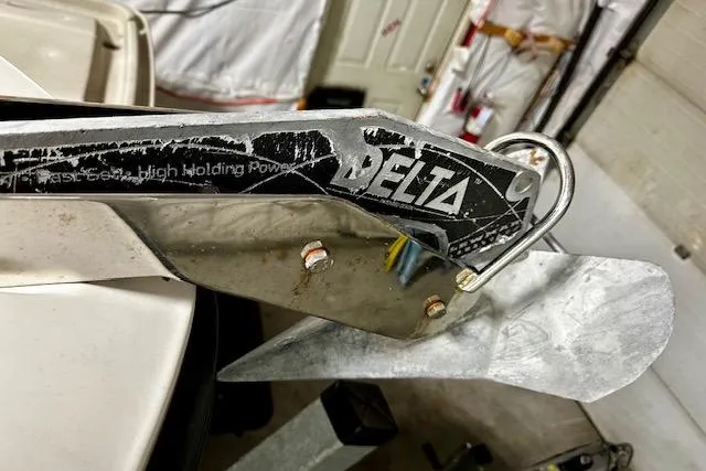  Yacht Photos Pics Delta anchor on a 2016 Boston Whaler 285 Conquest boat in a garage setting.