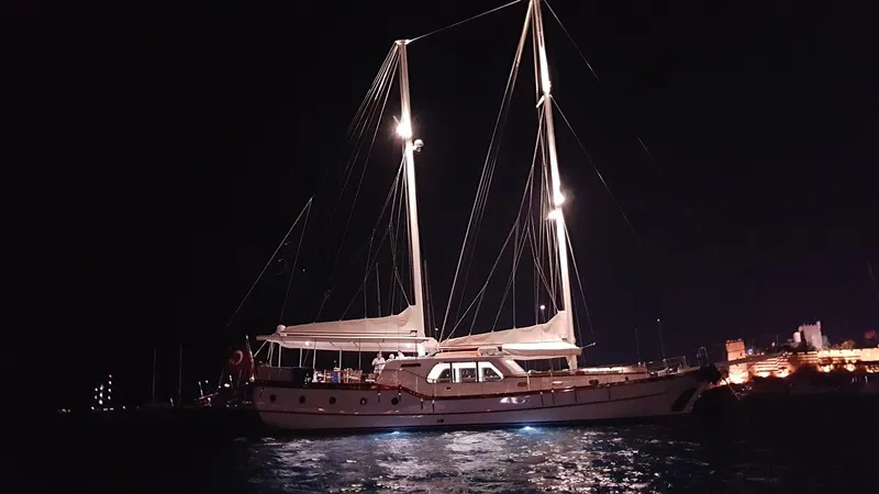  Yacht Photos Pics Custom 2017 GULET yacht illuminated at night on calm waters.