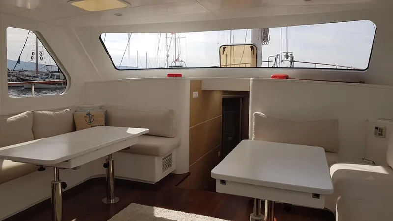  Yacht Photos Pics Interior of a 2017 Custom GULET yacht with seating and tables.