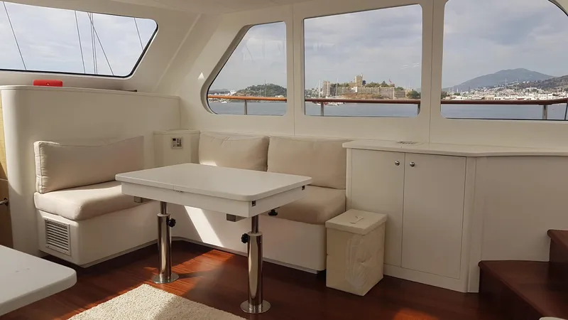  Yacht Photos Pics Luxurious 2017 Custom GULET yacht interior with elegant seating and scenic ocean views.