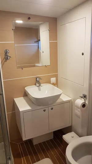  Yacht Photos Pics Modern bathroom on 2017 Custom GULET yacht with sink, mirror, and toilet.