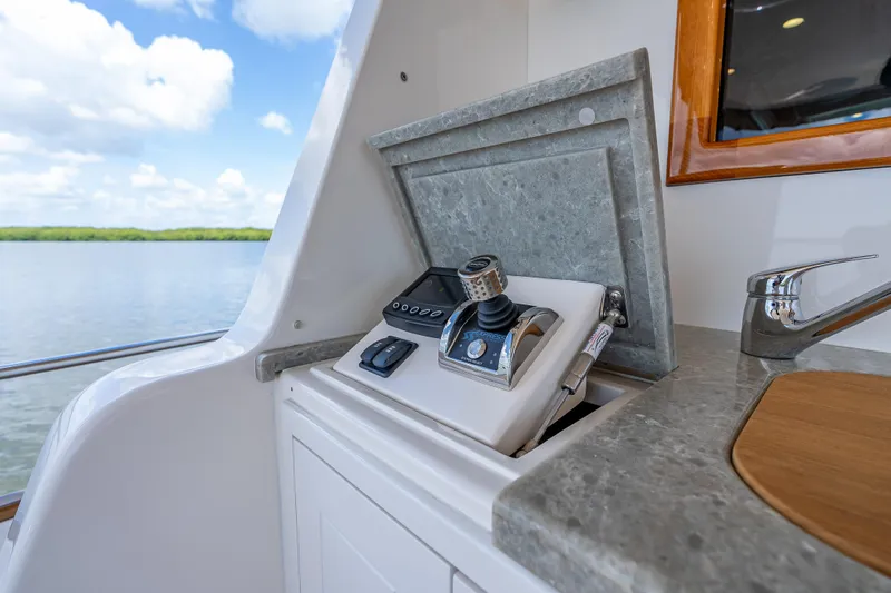 Escape Yacht Photos Pics Control panel on 2022 Grand Banks GB60 Skylounge yacht, featuring sleek design and modern technology.