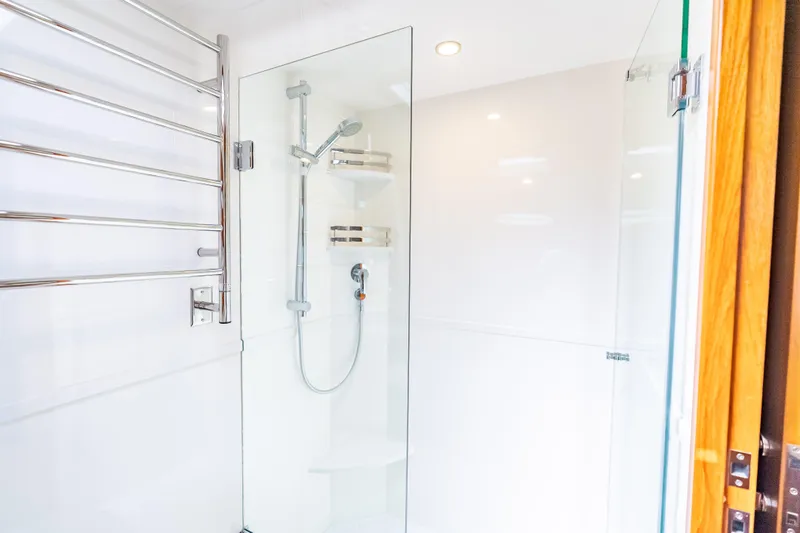 Escape Yacht Photos Pics Modern shower in 2022 Grand Banks GB60 Skylounge yacht bathroom.