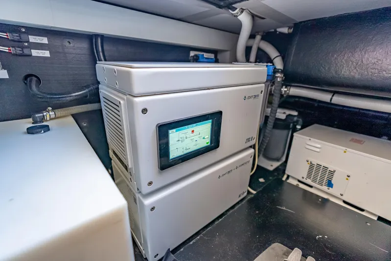 Escape Yacht Photos Pics Engine room of 2022 Grand Banks GB60 Skylounge with advanced control systems.