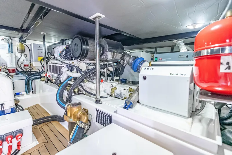 Escape Yacht Photos Pics Engine room of 2022 Grand Banks GB60 Skylounge yacht, showcasing advanced machinery and equipment.