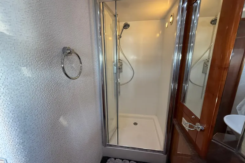  Yacht Photos Pics Luxurious bathroom shower in 2005 Sunseeker 75 Yacht with modern fixtures.