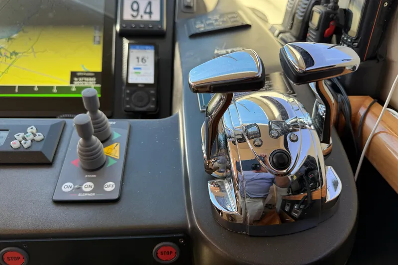  Yacht Photos Pics Control panel of a 2005 Sunseeker 75 Yacht with navigation and throttle controls.