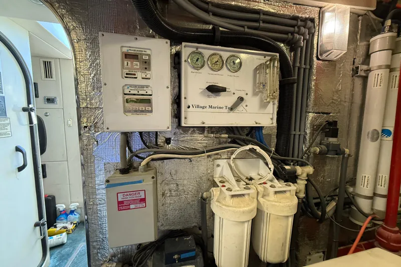  Yacht Photos Pics Engine room of 2005 Sunseeker 75 Yacht with control panels and filtration system.