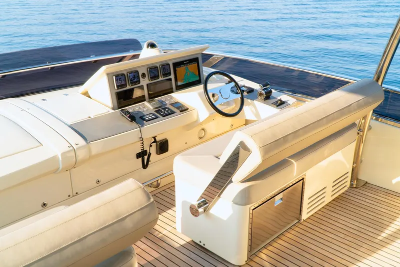Dolly Yacht Photos Pics Luxury yacht helm of 2015 Dominator 800 with modern navigation equipment.