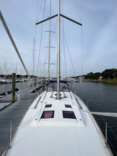 Serendipity Yacht Photos Pics 2013 Beneteau Oceanis 45 sailboat docked at a marina, view from the deck.