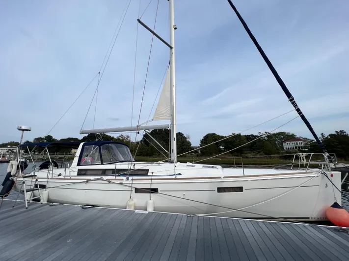 Serendipity Yacht Photos Pics 2013 Beneteau Oceanis 45 sailboat docked, featuring sleek design and spacious deck.