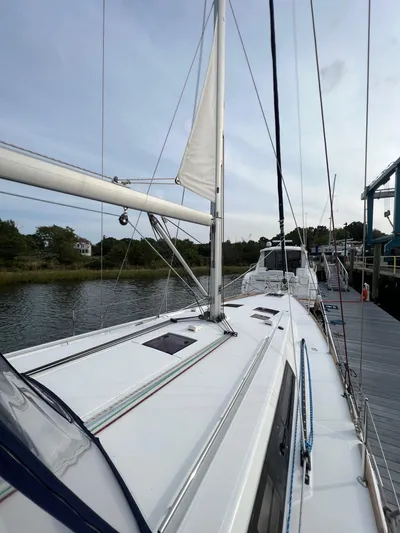 Serendipity Yacht Photos Pics 2013 Beneteau Oceanis 45 sailboat docked, showcasing deck and rigging.