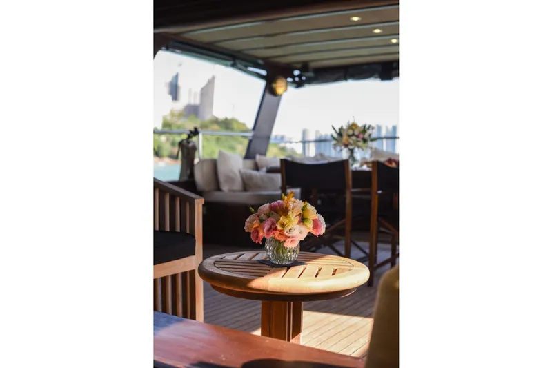 Gaiole Yacht Photos Pics Luxurious yacht interior with floral centerpiece, Custom Junk model, 1994.