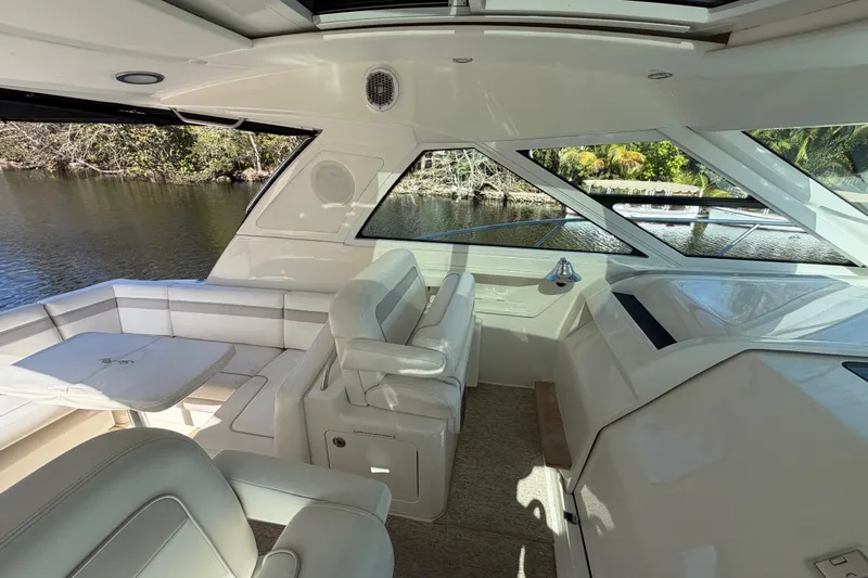  Yacht Photos Pics 2011 Sea Ray 450 Sundancer interior with luxurious seating and scenic water view.