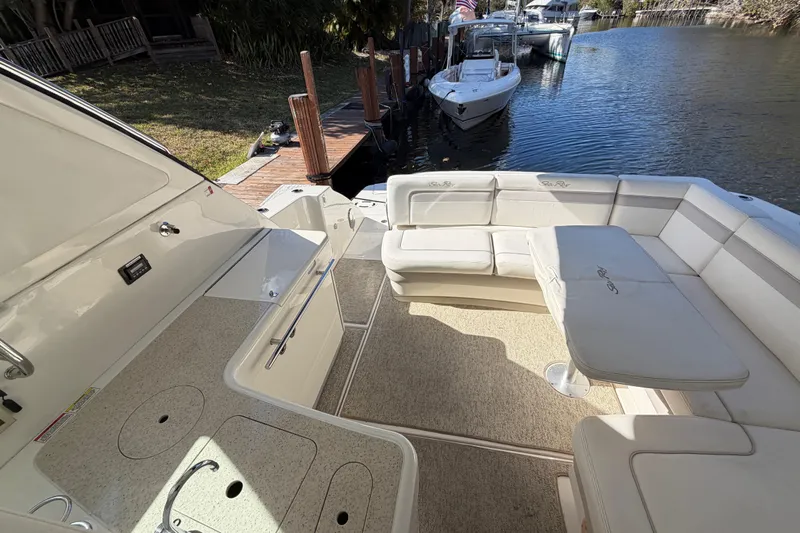  Yacht Photos Pics 2011 Sea Ray 450 Sundancer yacht with spacious seating and dockside view.