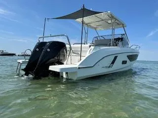  Yacht Photos Pics 2023 Beneteau Flyer 9 SUNdeck boat on clear water, rear view.