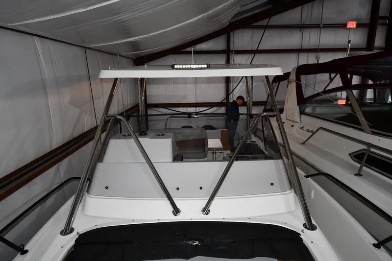  Yacht Photos Pics 2023 Beneteau Flyer 9 SUNdeck in storage, showcasing sleek design and spacious deck.