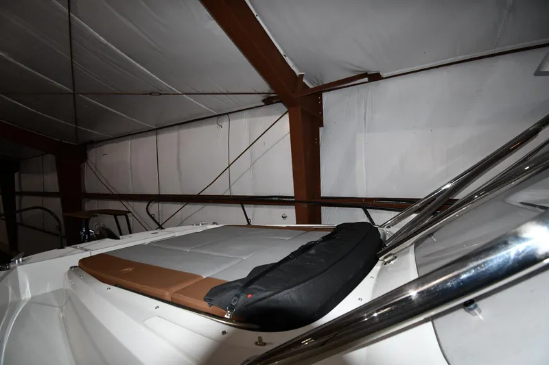  Yacht Photos Pics 2023 Beneteau Flyer 9 SUNdeck in storage, showcasing sleek design and comfortable seating.