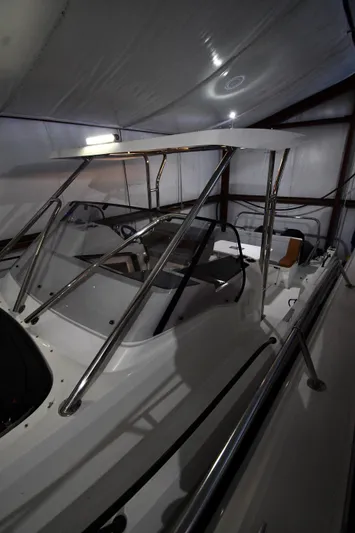  Yacht Photos Pics 2023 Beneteau Flyer 9 SUNdeck boat in storage, featuring sleek design and modern amenities.